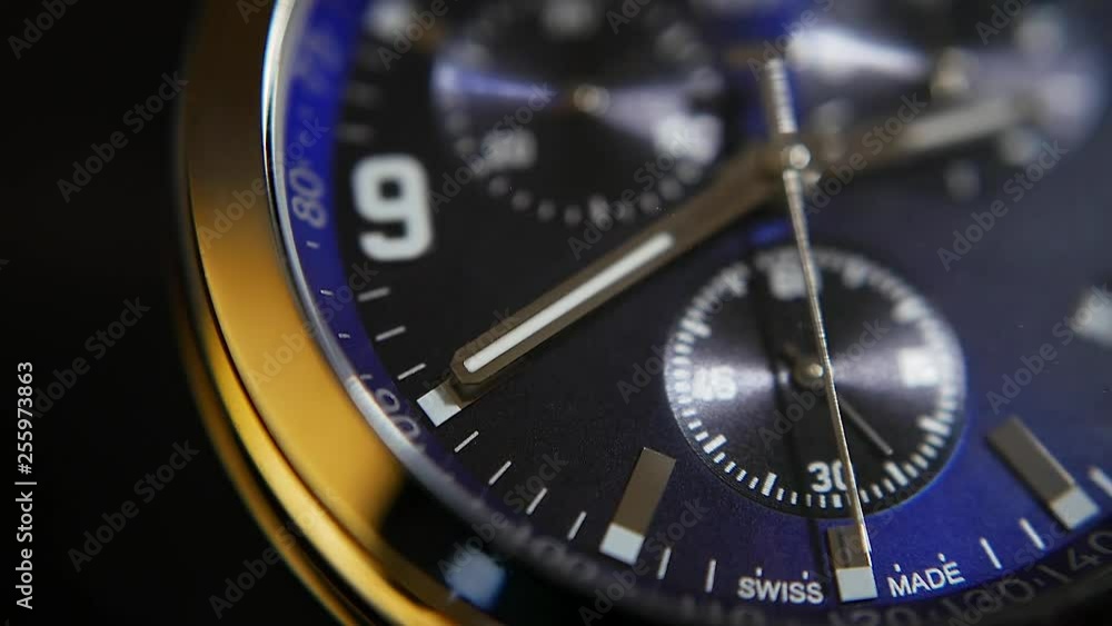 metal quartz watch with chronograph close - up metal quartz watch with chronograph close - up