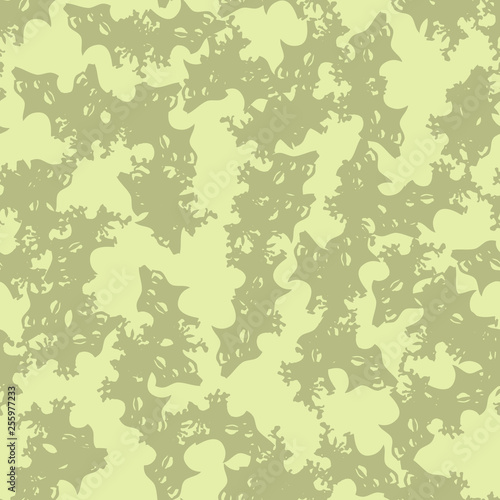 Desert camouflage of various shades of green and yellow colors