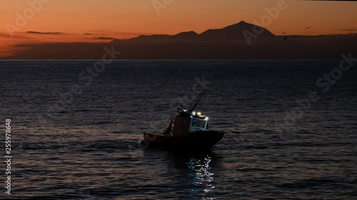 Beautyfull shot of fishing boat returning to dock.