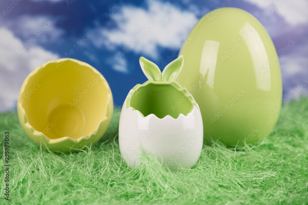 Fototapeta premium Easter, colorful eggs on a wooden table.