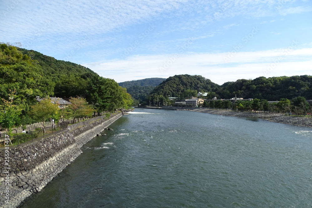 View of Uji river in the neighborhood of historical Byodo-in temple in Uji city, near Kyoto, Japan.