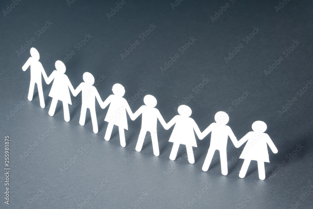 Chain of paper people rallying as in protest or demonstration, concept. Activism, social movement. Chain of paper people rallying as in protest or demonstration, concept. Activism, social movement.