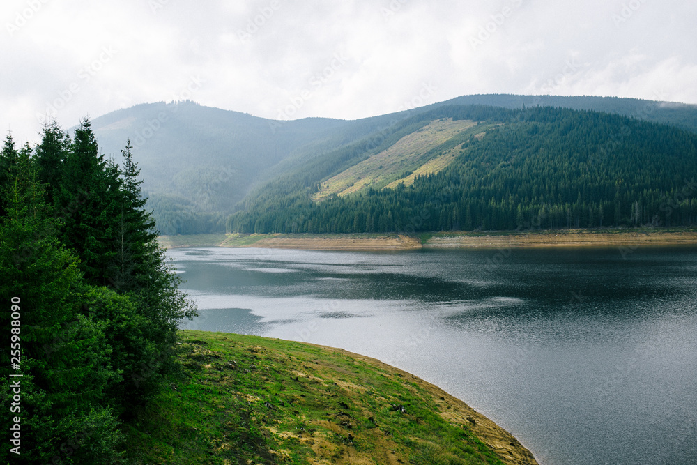 Beautiful mountain landscape with river view from Transalpine, the Carpathian Mountains of Romania. Horizontal outside shot.