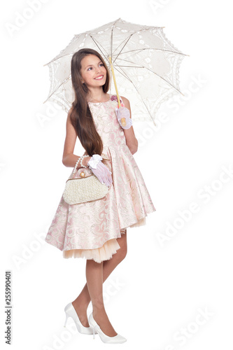 Portrait of beautiful girl with umbrella posing © aletia2011