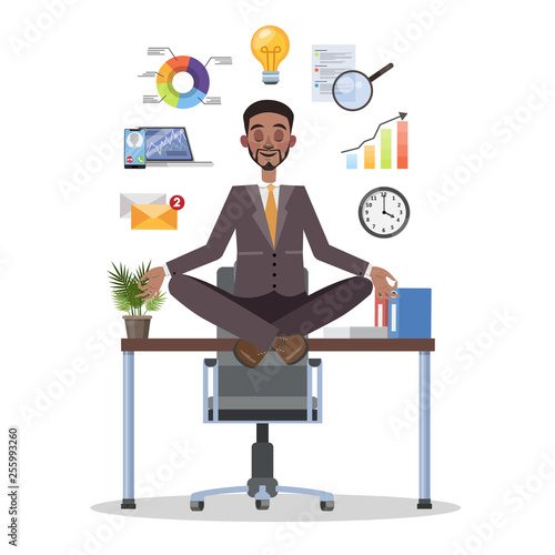 Businessman in lotus pose having break at work