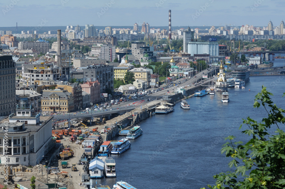 View of right side of the Dnieper river riverside, buildings and river port. Podol district, Kiev,Ukraine