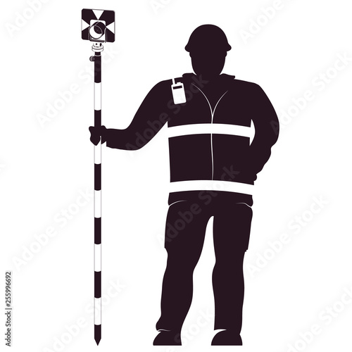 Surveyor in uniform with a working tool in his hand
