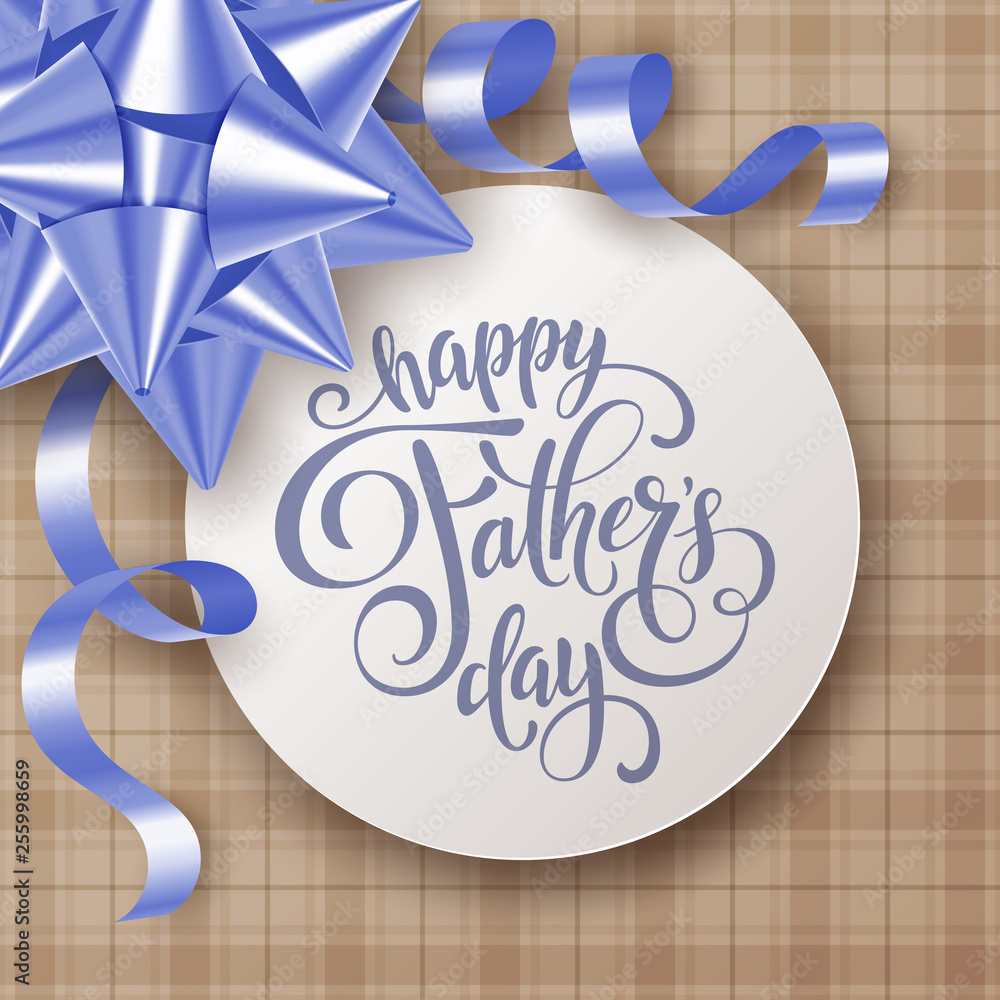 Obraz premium Fathers day greeting card with satin gift bow and handwritten message on tartan background