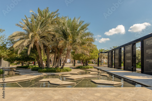 Clump of date treess and memorial, Abu Dhabi