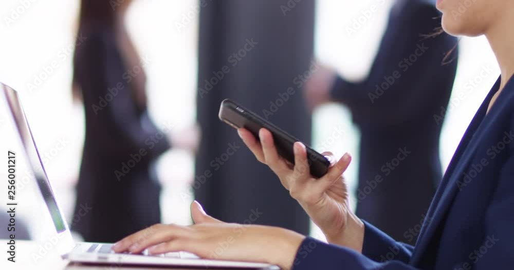 4K Close up on face of young businesswoman talking on cell phone & smiling 4K Close up on face of young businesswoman talking on cell phone & smiling