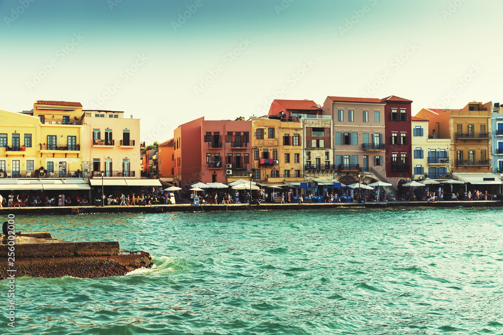 Colorful promenade and old port of Chania city on the island of Crete, Greece.