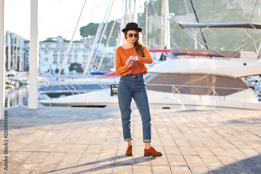 Young stylish girl in a sea port Young stylish girl in a sea port