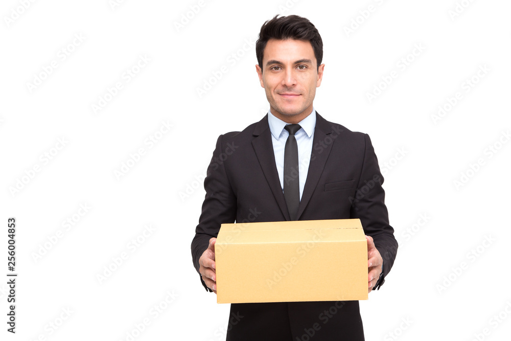 Portrait of a charming businessman dressed in suit holding parcel while standing and looking at camera isolated over white background, Professional of delivery concept Portrait of a charming businessman dressed in suit holding parcel while standing and looking at camera isolated over white background, Professional of delivery concept