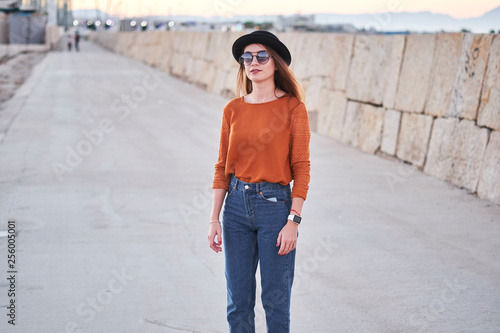 Young stylish girl walkig outdoors