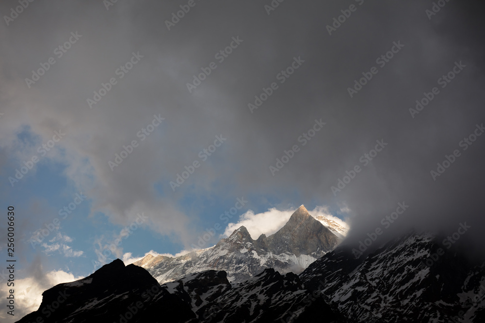 Mountains Nepal. Beautiful summer view with sun and blue sky clouds.