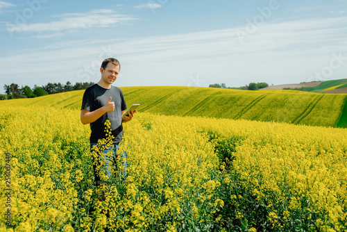 Agriculture Farmer holding tablet © volf anders