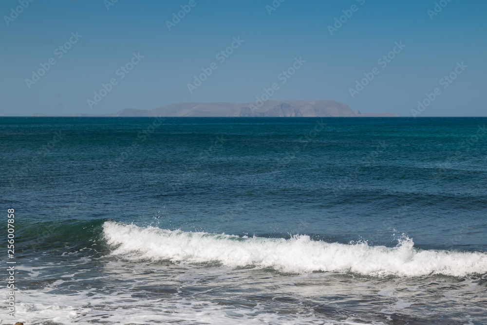 Sea, wave and a mountain, Crete, Greece
