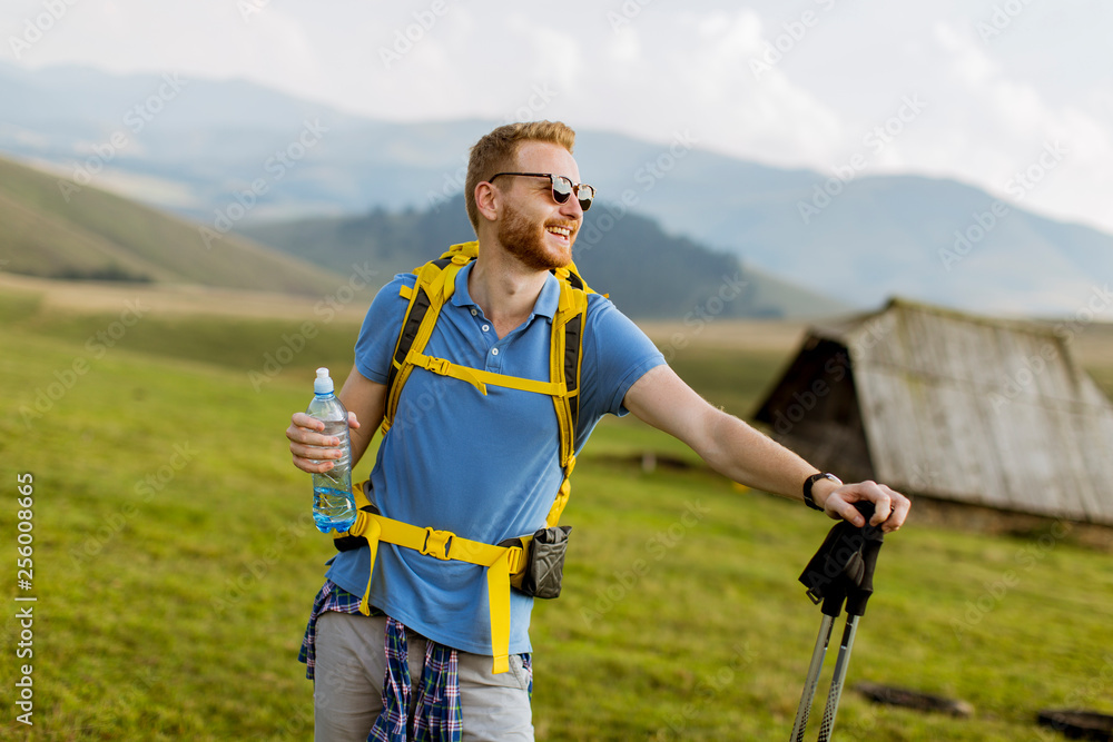 Handsome young red hair hiking man Handsome young red hair hiking man