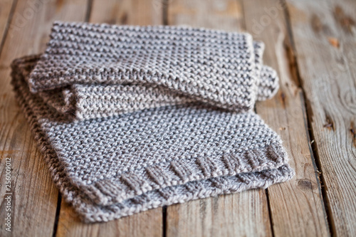 Beige knitted wooden scarf