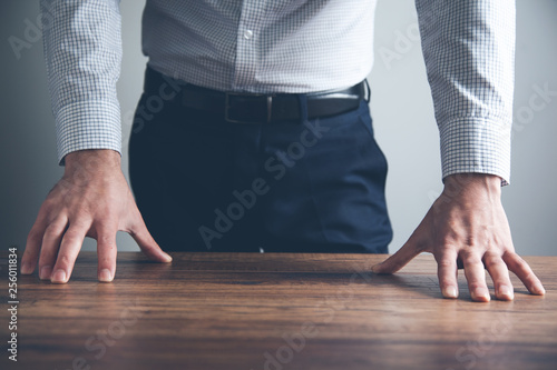 business man hand on desk