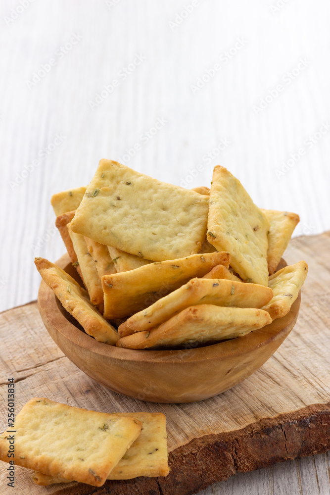 Dry salty cracker cookies in bowl on the table Dry salty cracker cookies in bowl on the table