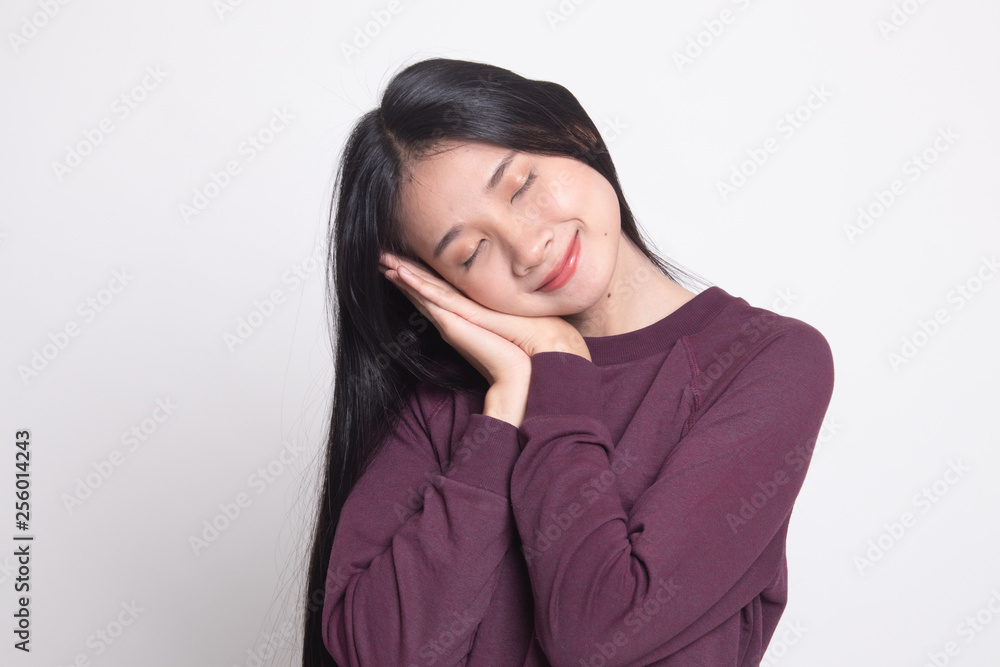 Beautiful young Asian woman with sleeping gesture. Beautiful young Asian woman with sleeping gesture.