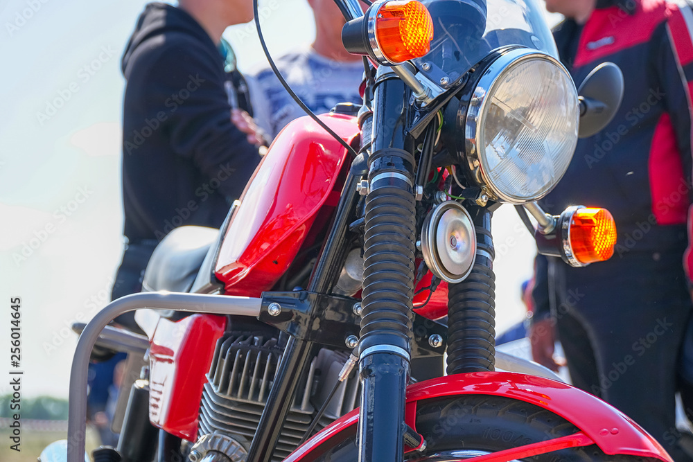 Fototapeta premium View of the motorcycle from the front. Selective focus