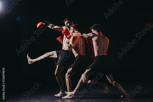 sequence shot of shirtless boxer in boxing gloves doing punch