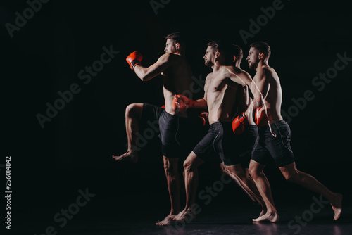 multiple exposure of strong muscular mma fighter in boxing gloves doing kick in jump