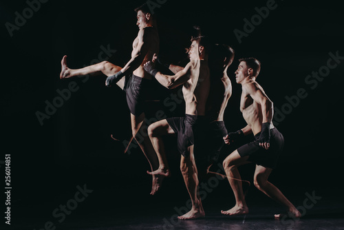 multiple exposure of strong barefoot muscular mma fighter doing kick in jump