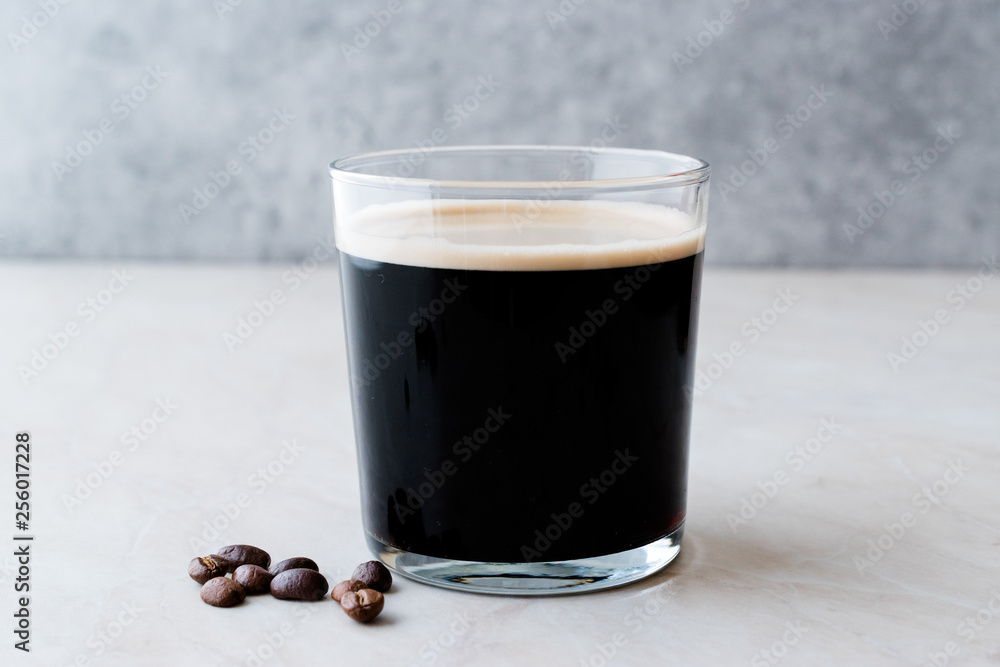 Frothy Cold Brew Nitro Coffee with Beans Ready to Drink. Frothy Cold Brew Nitro Coffee with Beans Ready to Drink.