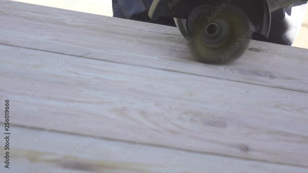 Sanding a wooden sheet with a grinder. Woodworking. Sanding a wooden sheet with a grinder. Woodworking.