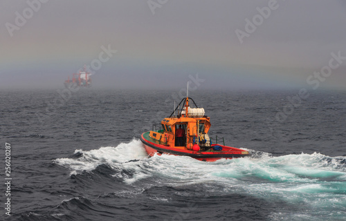 pilot boat on the sea waves