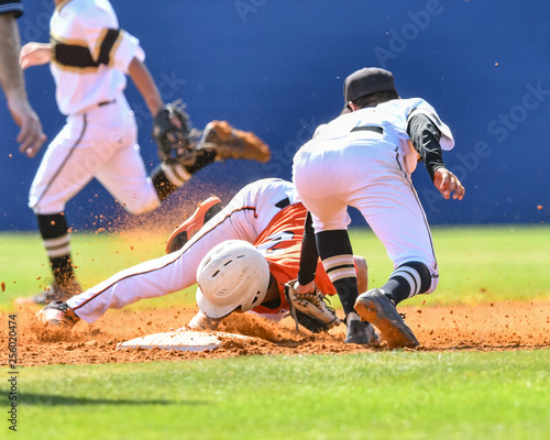 Canvas Print High School baseball players competing in a game