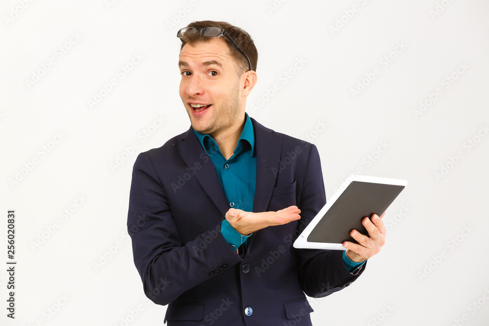 Cool businessman using electronic tablet on white background Cool businessman using electronic tablet on white background