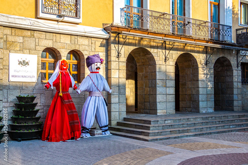 Giant Martenitsa figures of Pizho and Penda in front of the municipal building in Haskovo, Bulgaria
