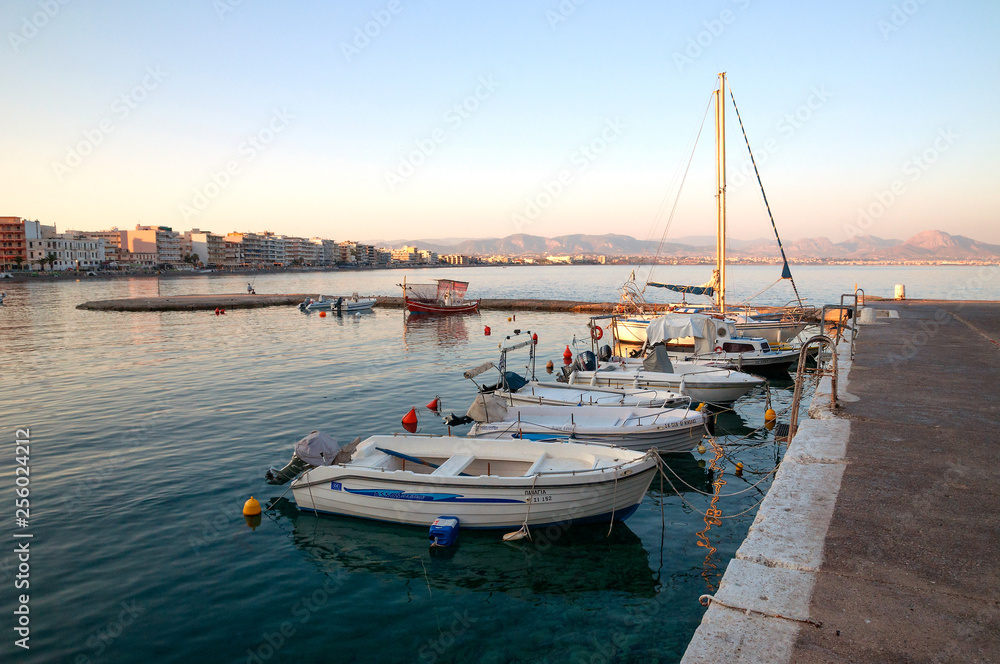 Boats and yachts in the first sun in Loutraki