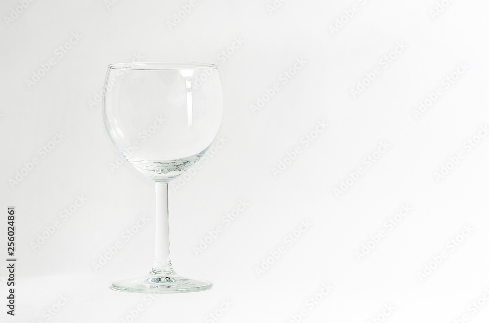 Empty wine glass on white background. Transparent on white. Glass. Tableware. Empty wine glass on white background. Transparent on white. Glass. Tableware.
