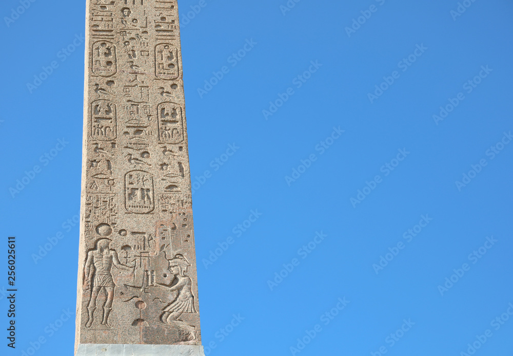 Egyptian obelisk with many symbols called hieroglyphics that wer
