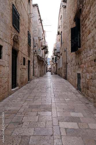 Fototapeta Naklejka Na Ścianę i Meble -  Narrow street inside Dubrovnik old town, Croatia