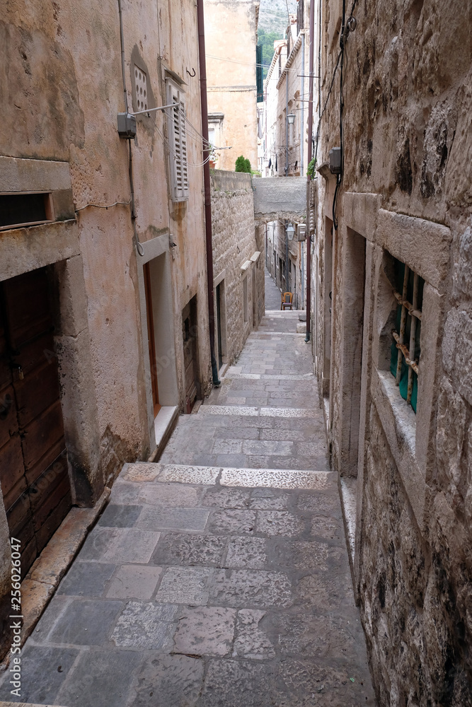 Narrow street inside Dubrovnik old town, Croatia 