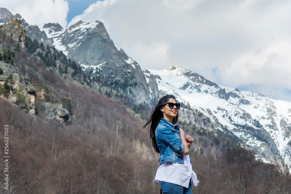 Beautiful Young  Woman with Sunglasses Outdoor Travelling in the Mountain 