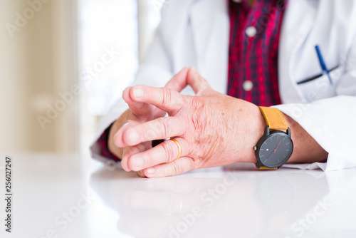 Close up of doctor man touching fingers © Krakenimages.com