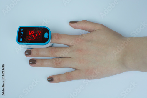 pulse oximeter hand white  background