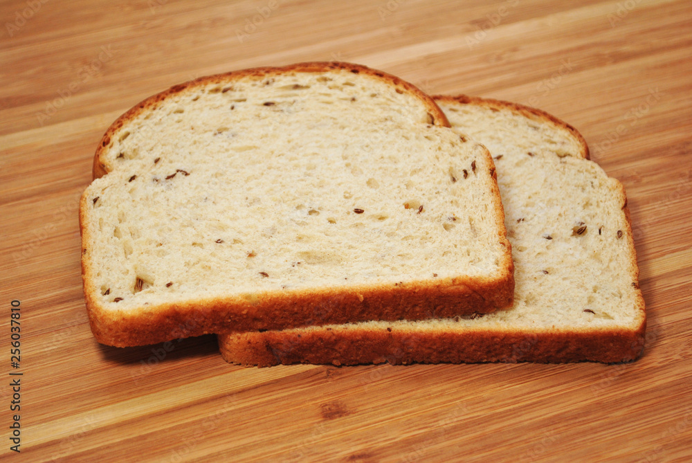 Two Slices of Fresh Rye Bread on White 