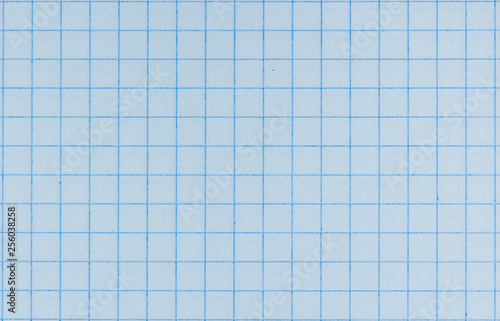 Blank paper sheet of a notebook. Grid. Blue. Background