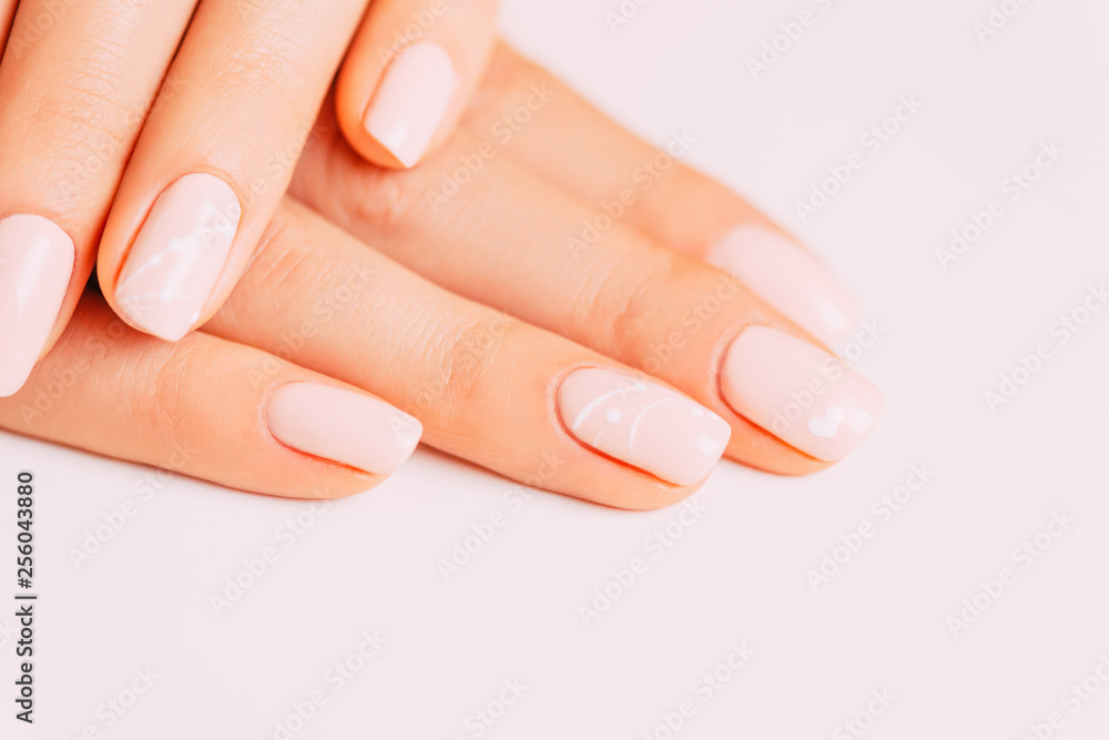 Hands of young woman with manicure art design. Hands of young woman with manicure art design.