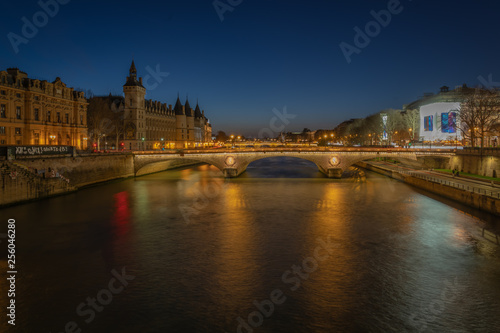 Paris, France - 03 10 2019: Palace of the City and Bridge to change by night