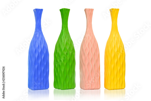 Multi-colored flower vases on a white background