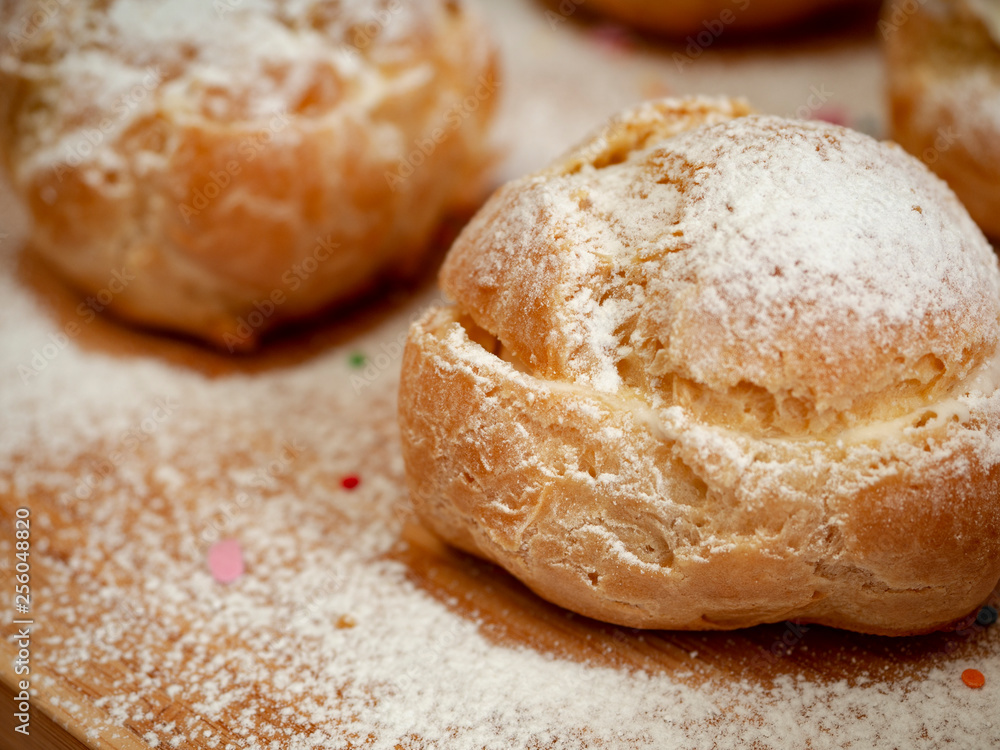 Naklejka premium Delicious tender profiteroles
